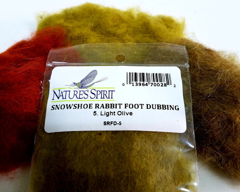 Packaged snowshoe rabbit foot dubbing with Natures Spirit label on a white background
